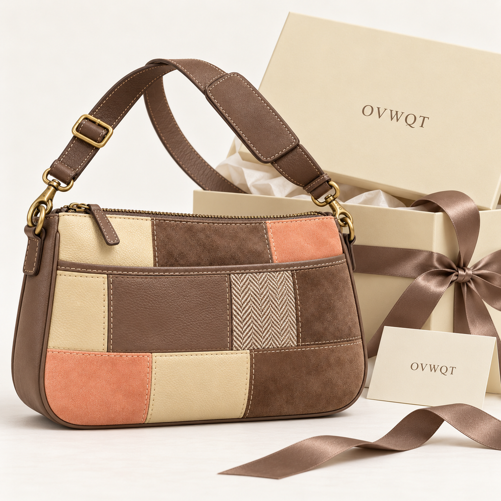 Gift presentation concept showing the patchwork crossbody bag beside a cream OVWQT box, ribbon and card.